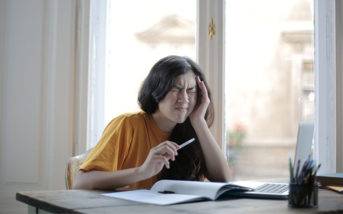 Young woman with headache