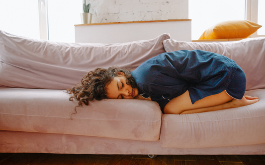 Women sleeping on couch